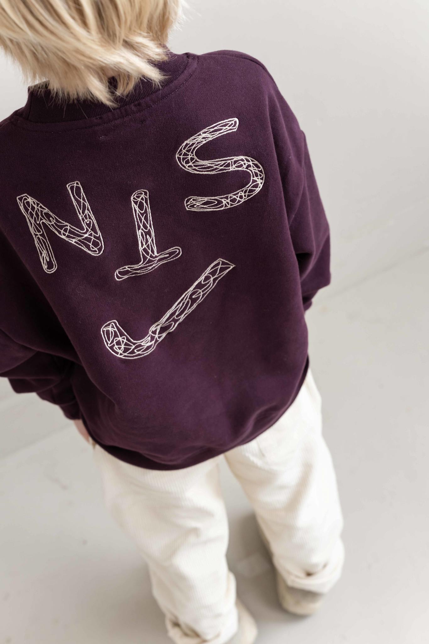 JNST SWEATER