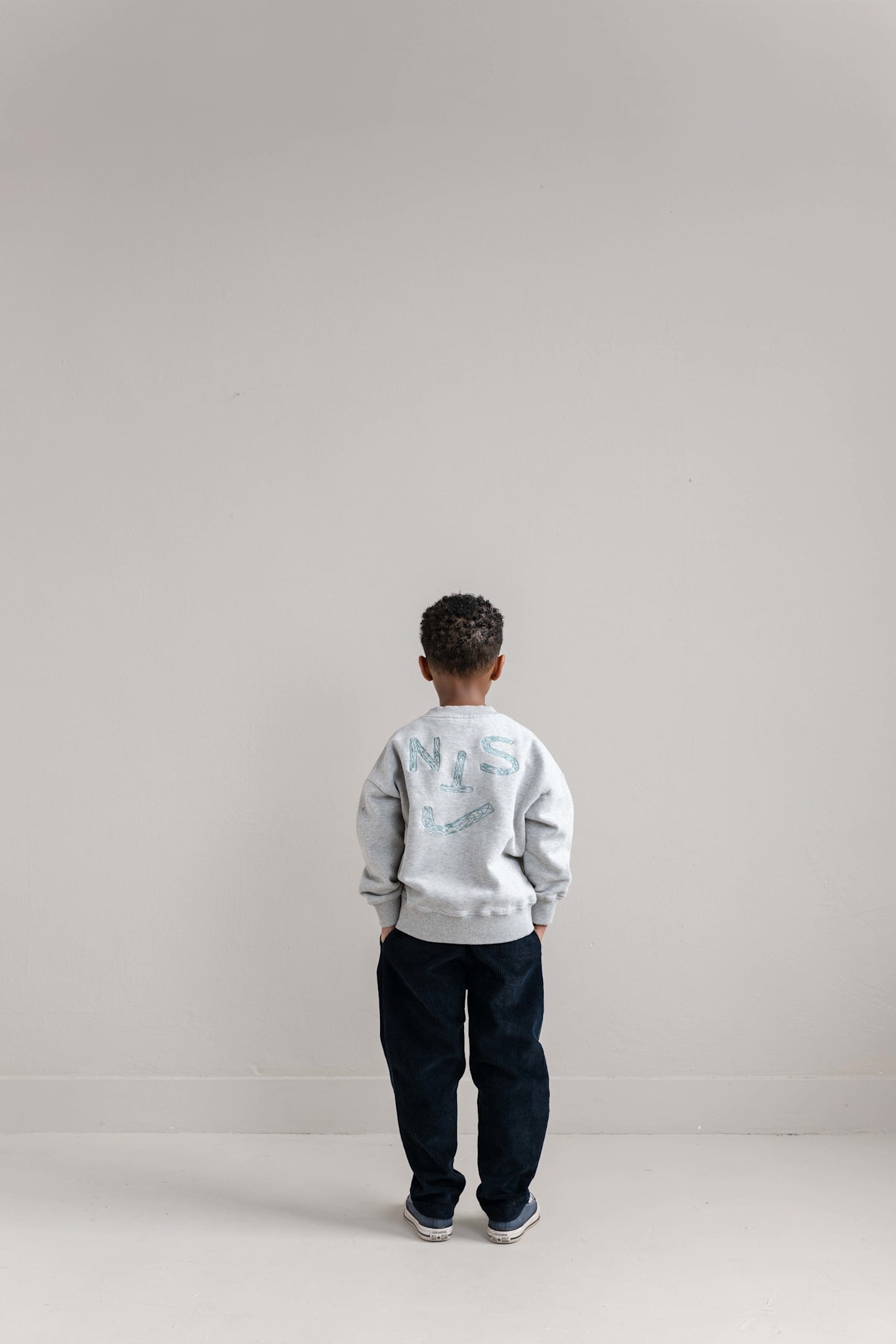JNST SWEATER
