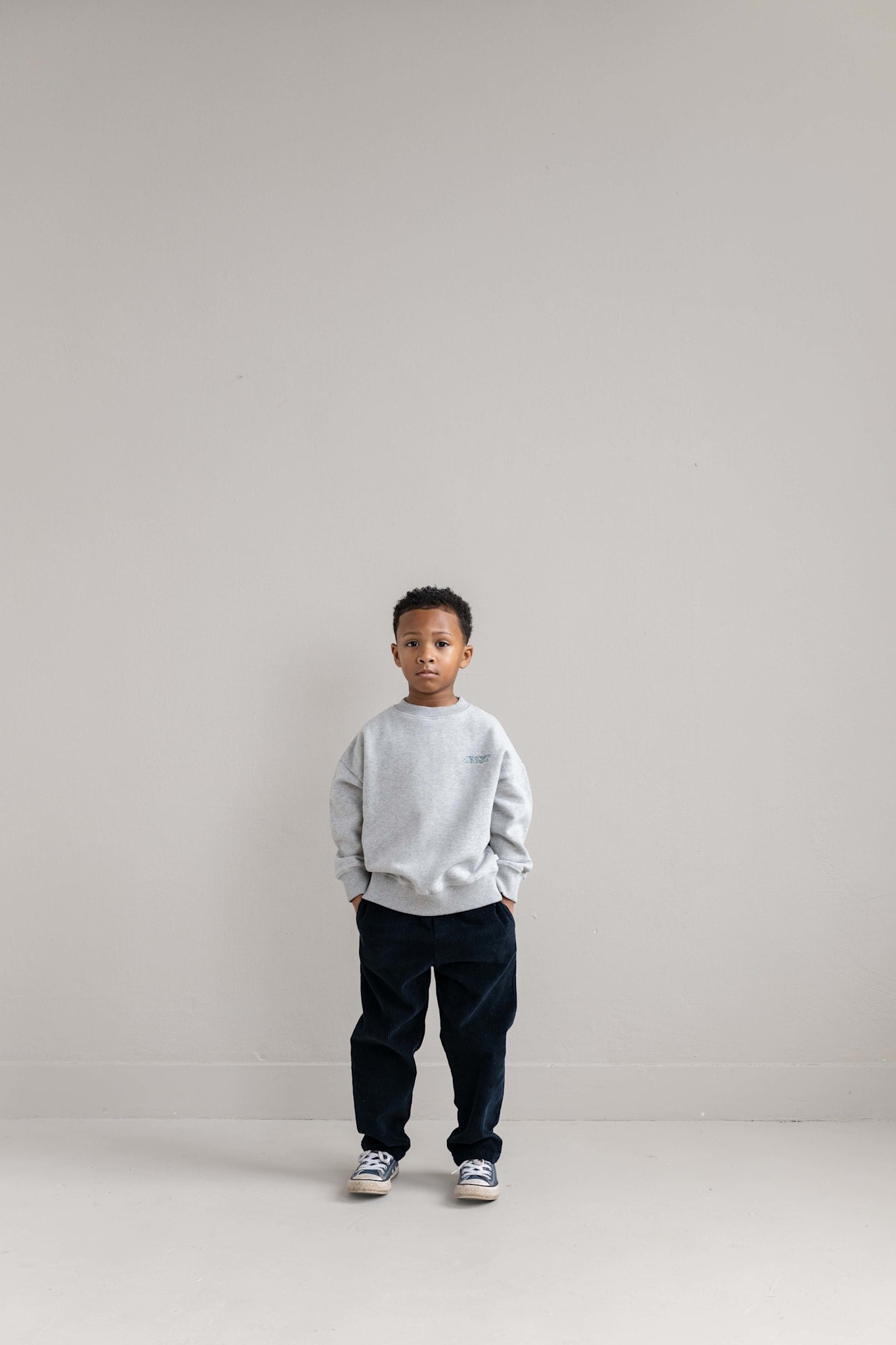 JNST SWEATER