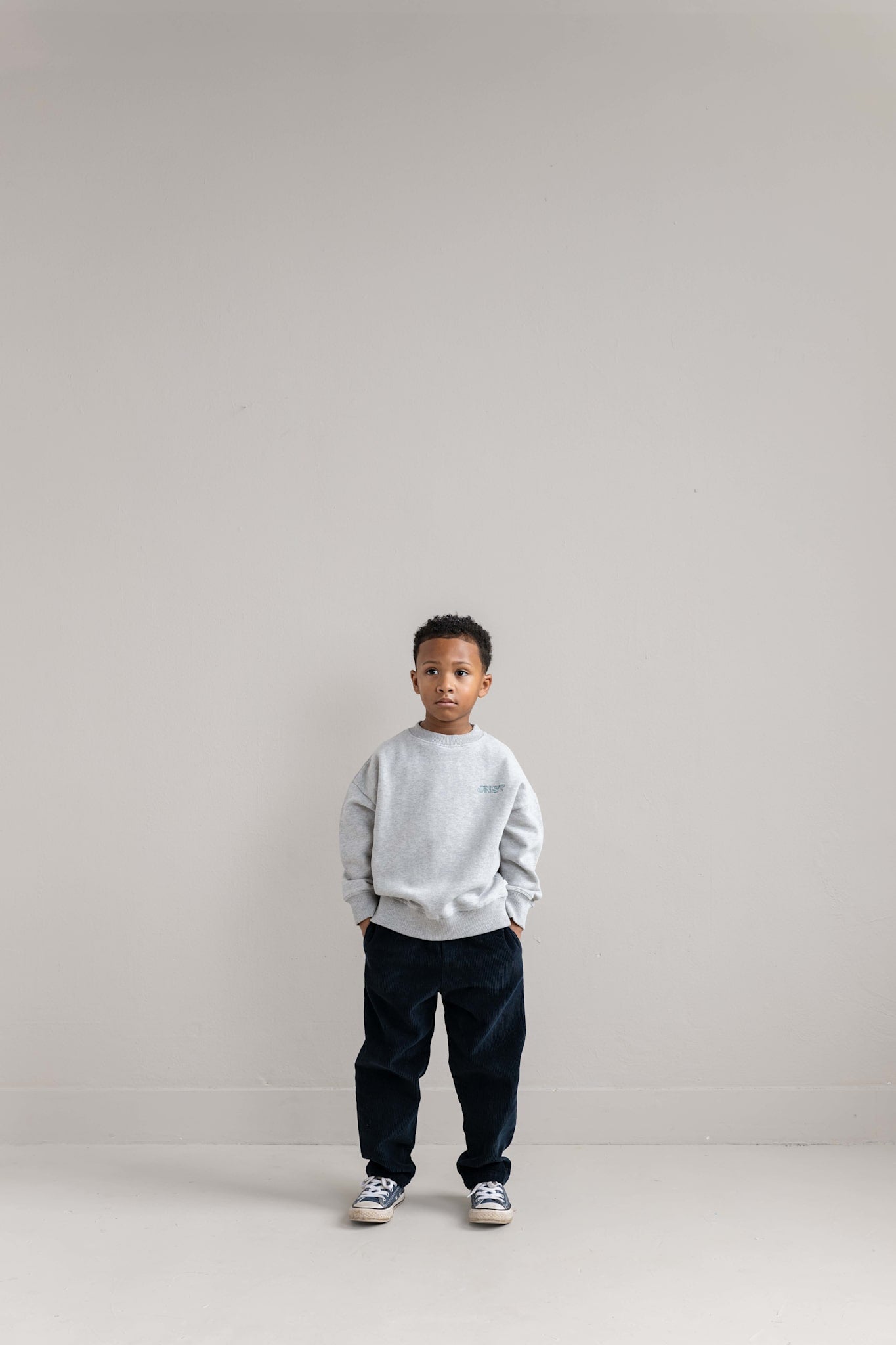 JNST SWEATER